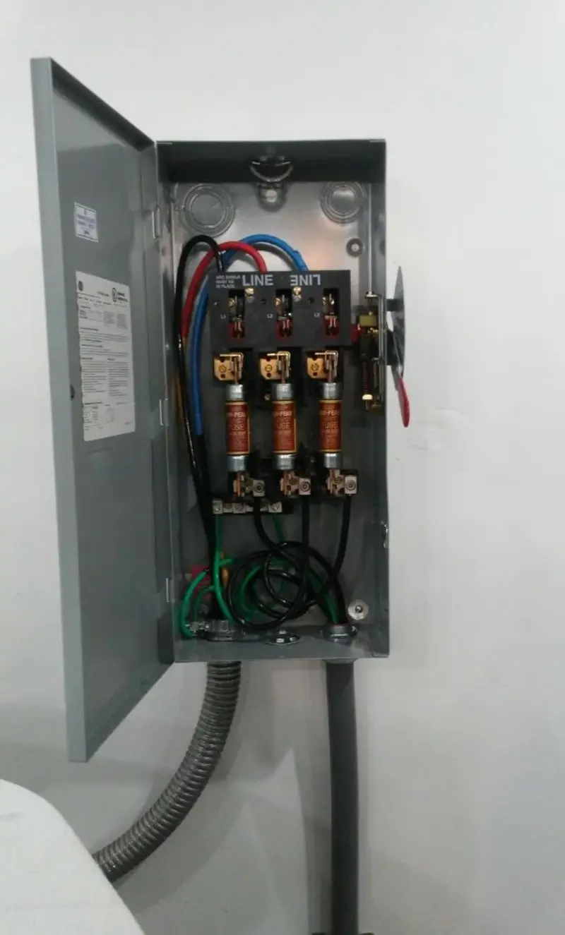 Three-phase disconnect switch installed for Smoke Detector Installation in Ocean